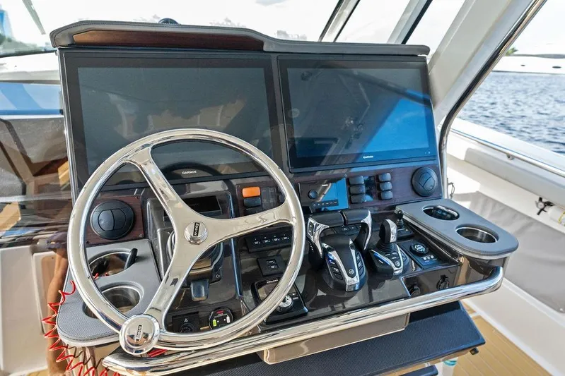 No Vacancy Yacht Photos Pics 2022 Pursuit S 428 Sport boat helm with dual screens and controls.