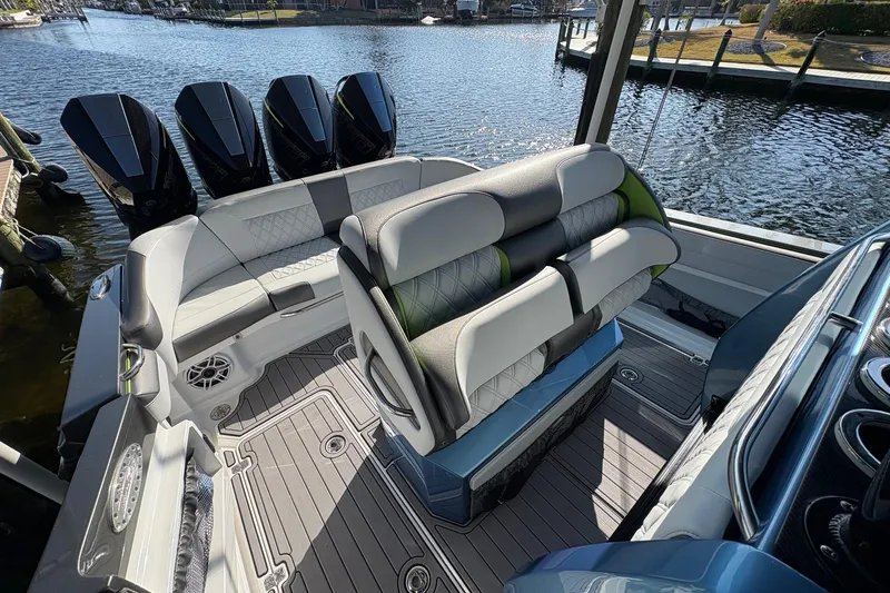  Yacht Photos Pics 2023 Nor-Tech 390 Sport Center Console boat interior with luxurious seating and powerful engines.