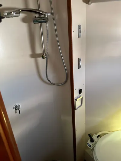 Sarama Yacht Photos Pics 1988 Custom Ancosta Dubois yacht bathroom with shower and toilet.