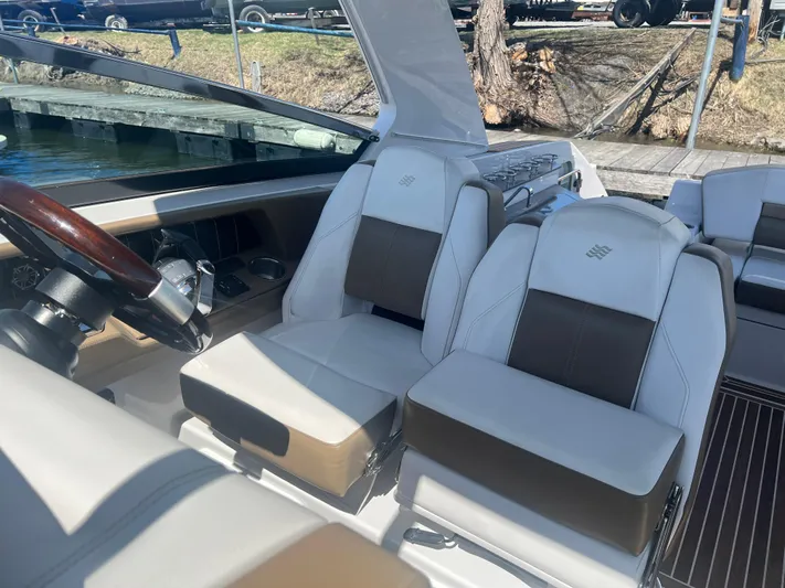  Yacht Photos Pics 2015 Four Winns H350 boat interior with dual white and brown seats.