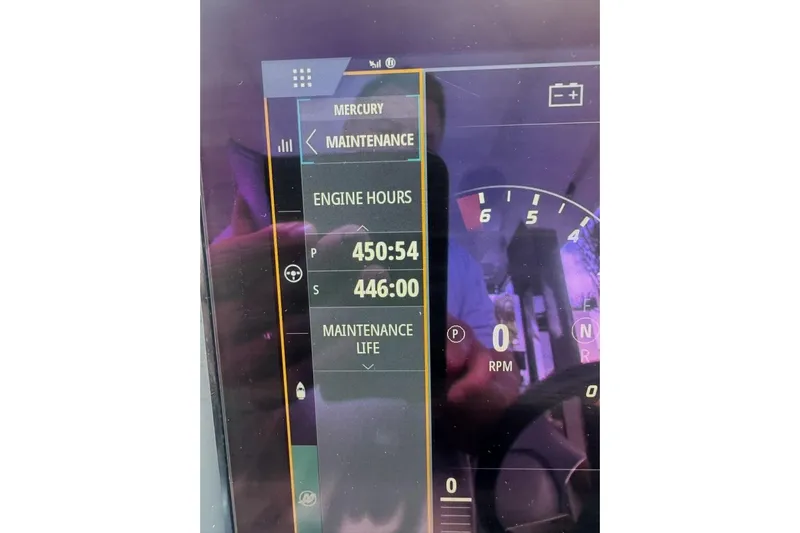 Nim2021xyz21 Yacht Photos Pics Dashboard display of Nimbus T11, 2021 model, showing engine hours and maintenance details.