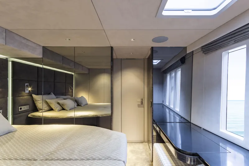 Naoma Yacht Photos Pics Luxurious interior of 2022 Sunreef 70 NAOMA yacht with modern bedroom design.
