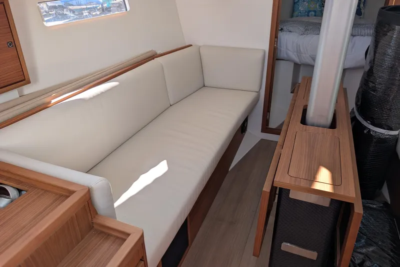 Blue Yonder Yacht Photos Pics 2024 J Boats J/112E interior with sleek wood finish and comfortable seating.
