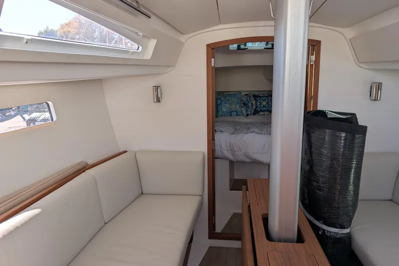 Blue Yonder Yacht Photos Pics Interior of 2024 J Boats J/112E sailboat with cozy seating and cabin view.