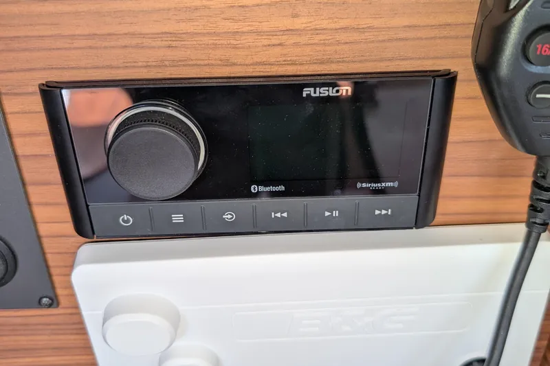 Blue Yonder Yacht Photos Pics Fusion audio system on 2024 J Boats J/112E yacht, featuring Bluetooth and SiriusXM capabilities.
