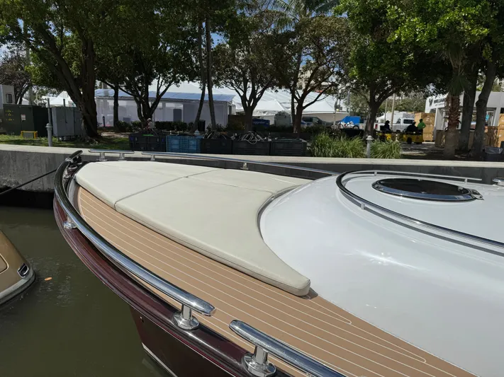 Gazelle Yacht Photos Pics 2014 Zeelander Z44 yacht with sleek deck design, docked near lush greenery.