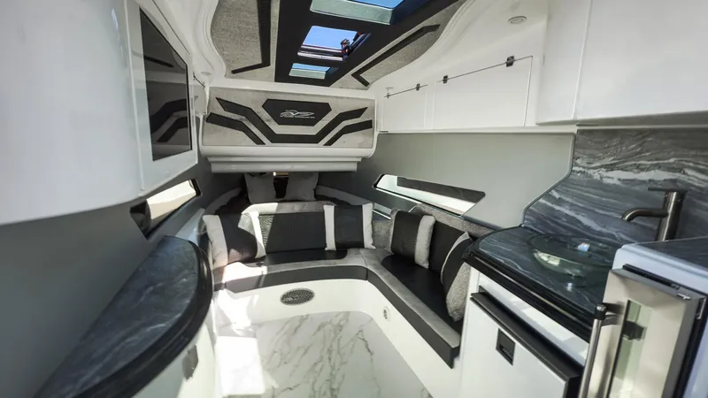  Yacht Photos Pics Luxurious interior of 2022 MTI V50 boat with modern design and sleek finishes.