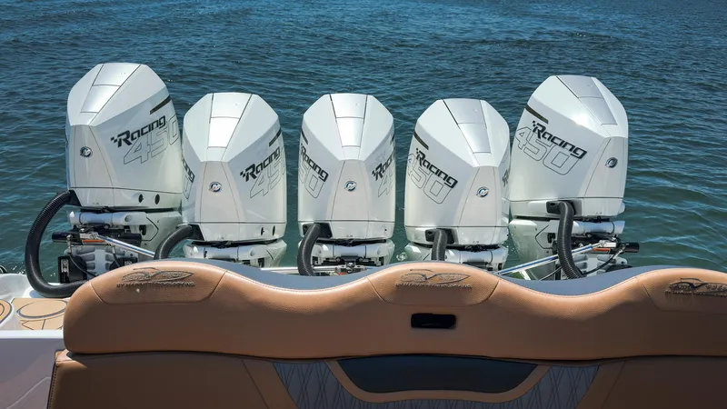  Yacht Photos Pics Five powerful outboard motors on an MTI V50 boat, 2022 model, in the water.