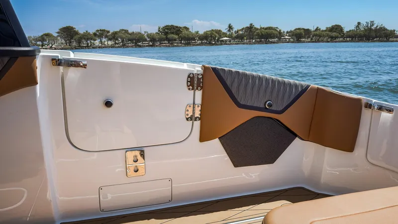  Yacht Photos Pics Interior view of 2022 MTI V50 boat, featuring sleek design and water in the background.