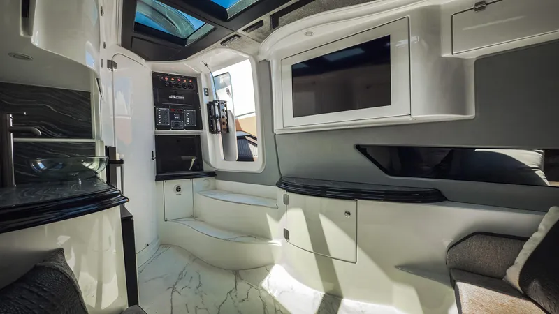  Yacht Photos Pics Luxurious interior of 2022 MTI V50 boat with modern amenities and sleek design.