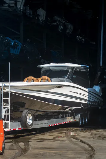  Yacht Photos Pics 2022 MTI V50 boat on trailer in storage facility.