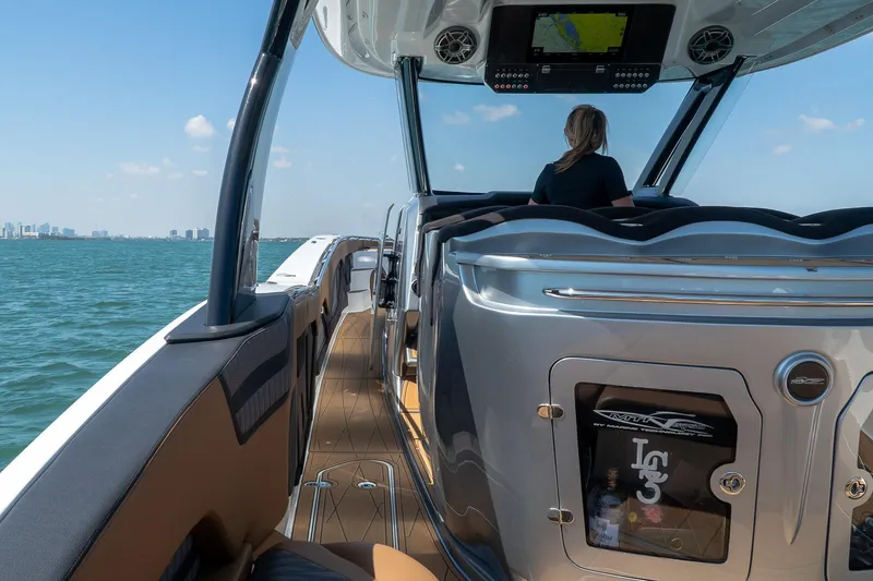  Yacht Photos Pics Luxury MTI V50 boat interior cruising on open water, 2022 model.