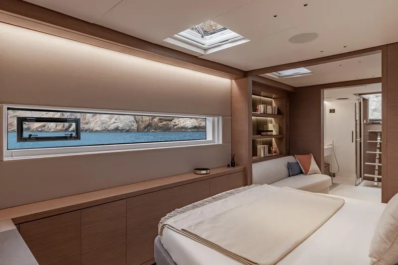  Yacht Photos Pics Manufacturer Provided Image: Luxurious interior of 2026 Lagoon SIXTY 7 yacht with scenic ocean view.