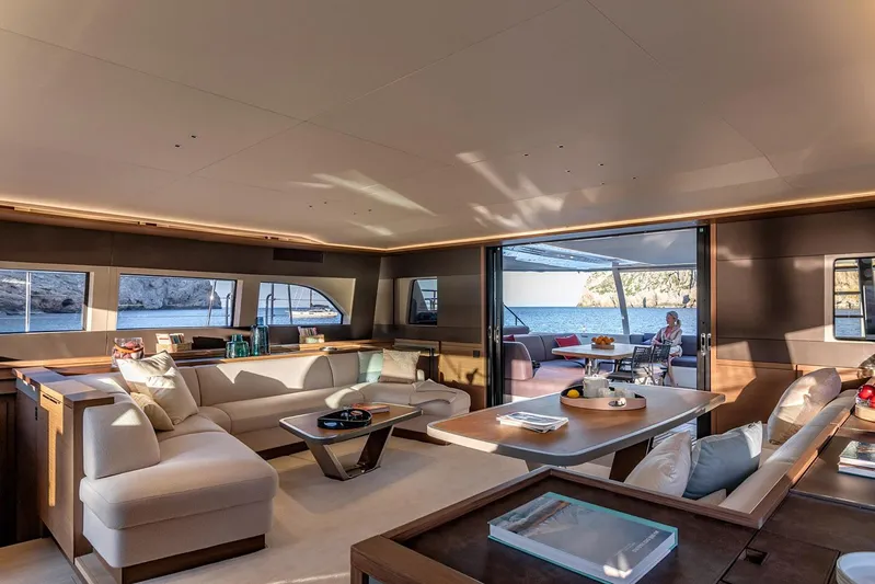  Yacht Photos Pics Manufacturer Provided Image: Luxurious interior of 2026 Lagoon SIXTY 7 yacht with spacious seating and ocean view.