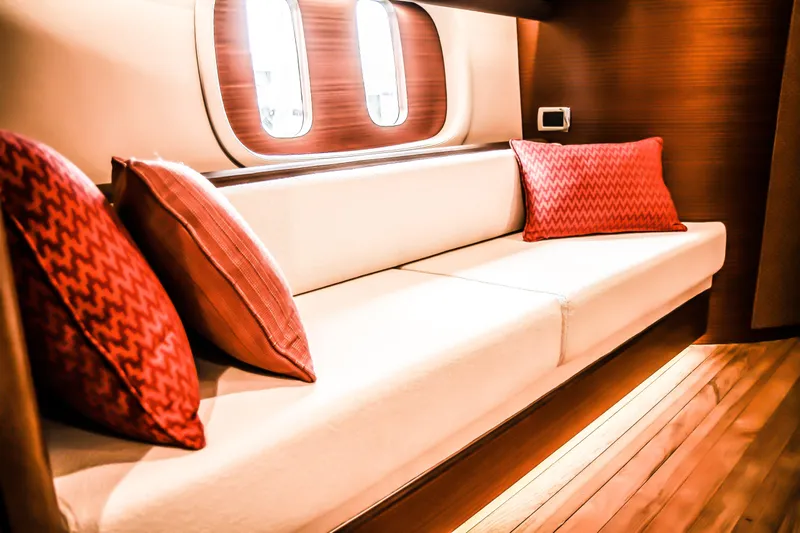 Gazelle Yacht Photos Pics Luxurious interior of 2014 Zeelander Z44 yacht with elegant seating and red cushions.