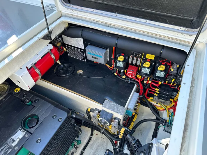  Yacht Photos Pics Engine compartment of a 2019 Targa 32 boat, showcasing wiring and components.