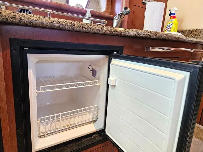  Yacht Photos Pics Open mini fridge in 2007 Sea Ray 40 Sundancer yacht kitchen.
