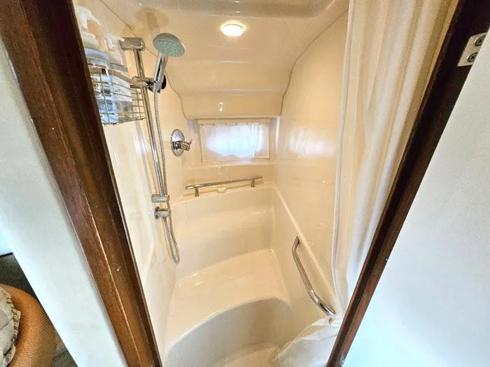  Yacht Photos Pics Shower area in 2007 Sea Ray 40 Sundancer yacht, featuring modern fixtures and lighting.