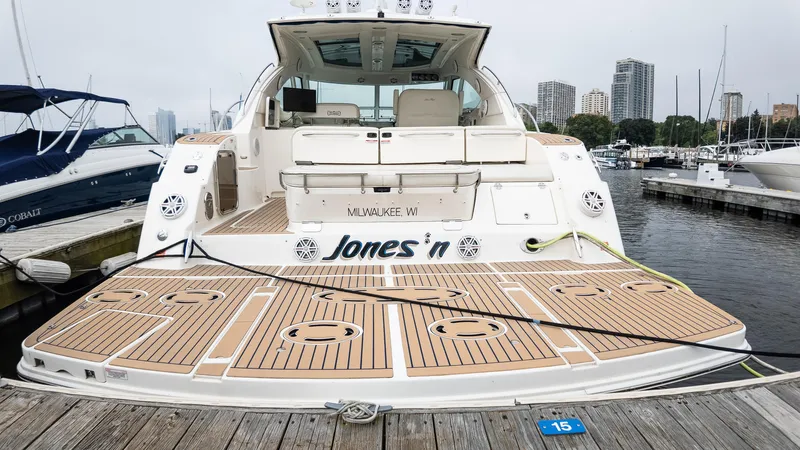 Jones'n Yacht Photos Pics 2009 Sea Ray 470 Sundancer yacht docked at marina, rear view.