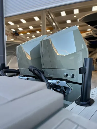  Yacht Photos Pics 2024 G-Tender DIECI boat engines in a modern showroom setting.