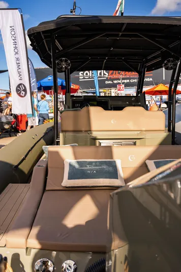  Yacht Photos Pics 2024 G-Tender DIECI luxury boat at a vibrant outdoor exhibition.