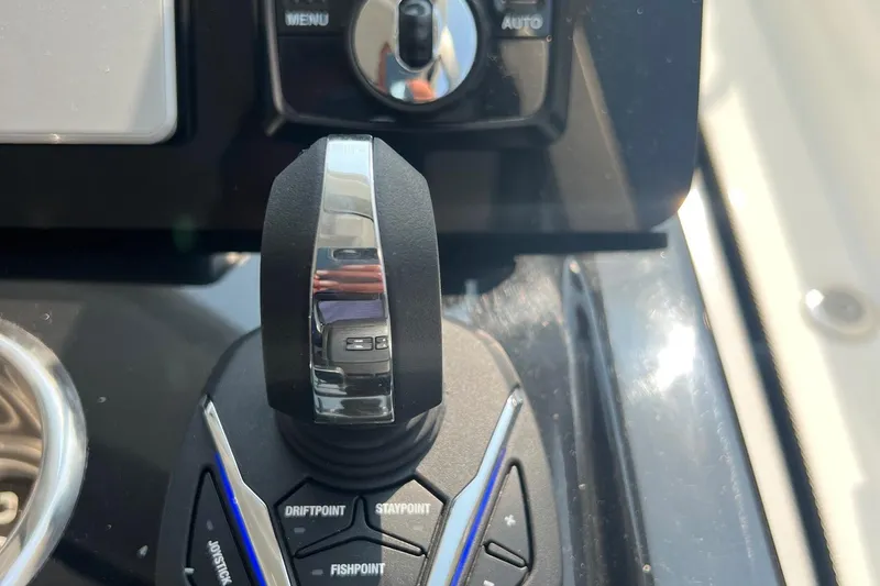  Yacht Photos Pics Control panel of 2024 Jeanneau NC 1295 Fly boat with joystick and buttons.