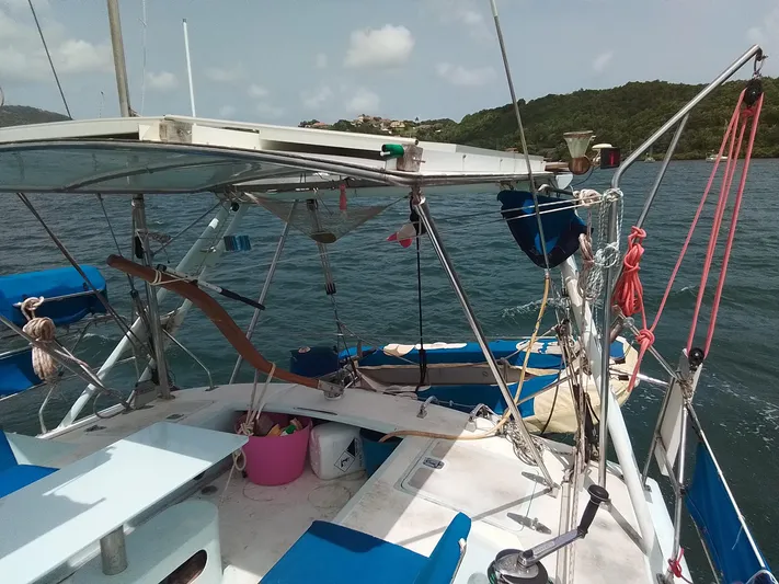 Atanahoue Yacht Photos Pics Sailboat "Paladin 60" on water, featuring deck and rigging, with scenic coastal background.