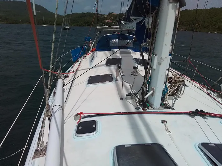 Atanahoue Yacht Photos Pics Sailboat deck view, Custom Paladin 60, 2000 model, anchored in scenic waters.