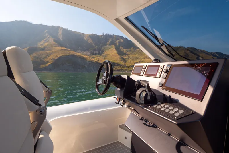  Yacht Photos Pics Cockpit of 2025 Anvera 42 yacht with scenic mountain view.
