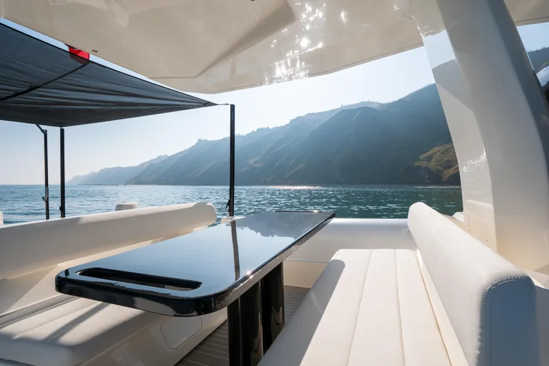  Yacht Photos Pics Luxurious 2025 Anvera 42 yacht interior with ocean view and sleek seating.