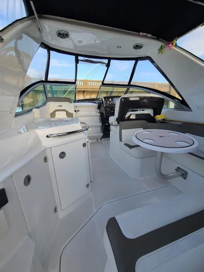  Yacht Photos Pics Interior of 2018 Monterey 295 Sport Yacht with modern seating and helm.