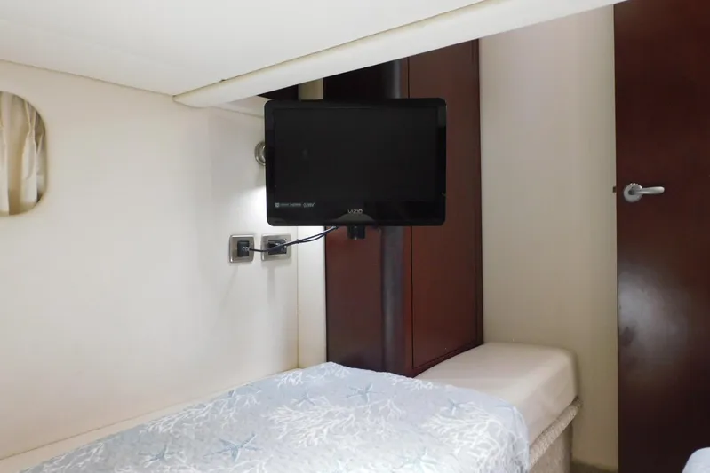 Full Deck Yacht Photos Pics 2008 Sea Ray 44 Sedan Bridge cabin with TV and bed.