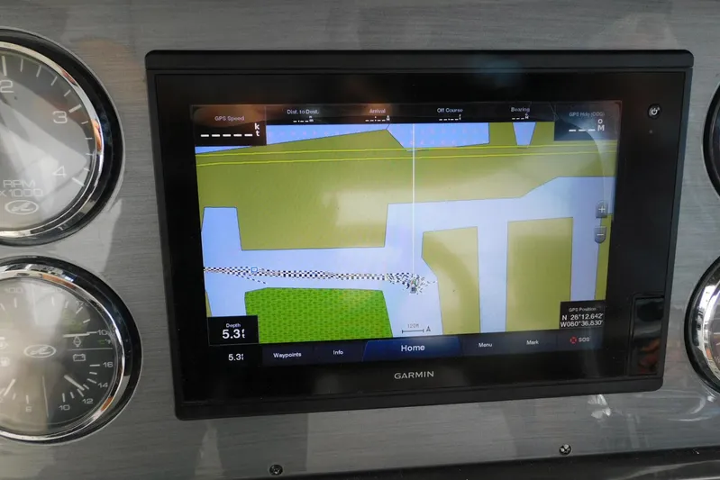 Full Deck Yacht Photos Pics Garmin navigation display on 2008 Sea Ray 44 Sedan Bridge, showing GPS and depth information.