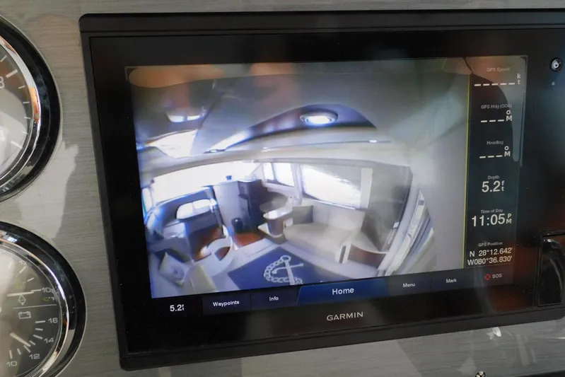 Full Deck Yacht Photos Pics Garmin display on 2008 Sea Ray 44 Sedan Bridge showing interior and navigation data.
