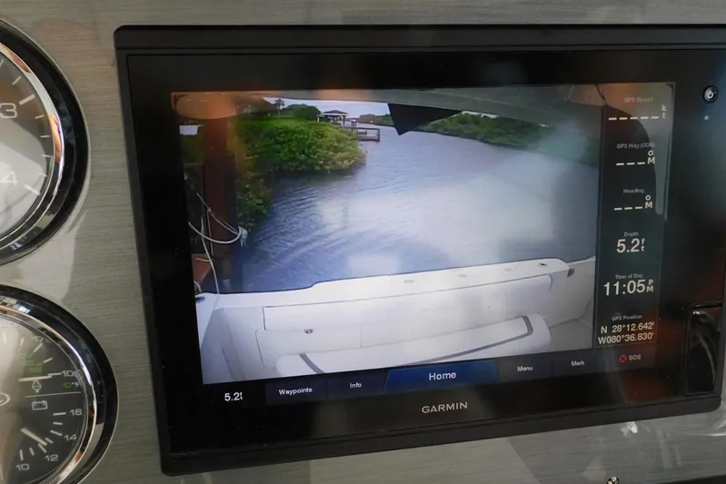 Full Deck Yacht Photos Pics Garmin display on 2008 Sea Ray 44 Sedan Bridge showing waterway and navigation data.