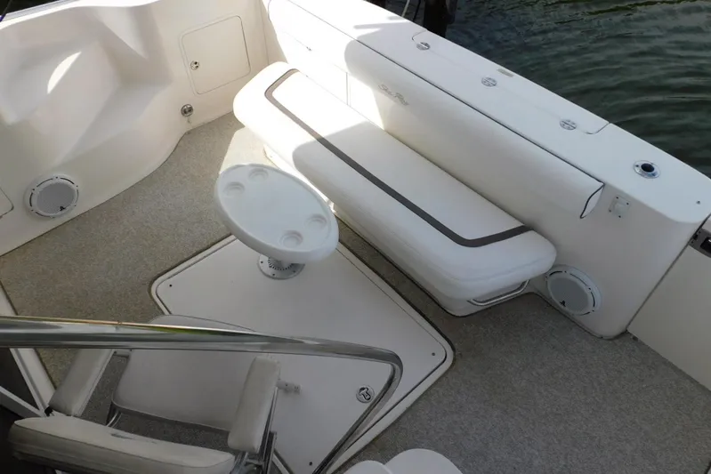 Full Deck Yacht Photos Pics 2008 Sea Ray 44 Sedan Bridge boat deck with seating and table.