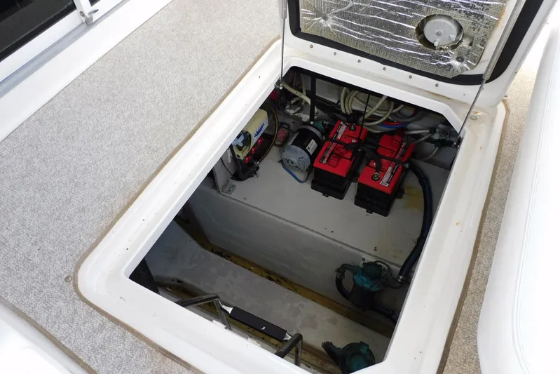 Full Deck Yacht Photos Pics 2008 Sea Ray 44 Sedan Bridge engine compartment with batteries and wiring.