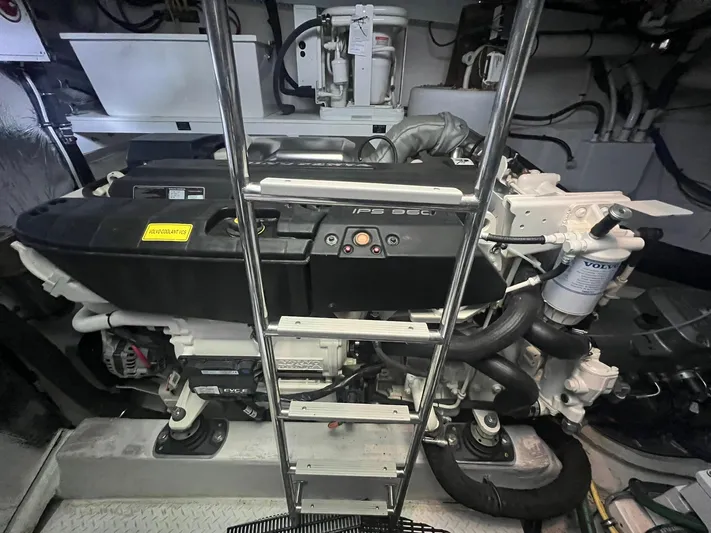 Mon Cheri Yacht Photos Pics Engine room of 2018 Cruisers Yachts 54 Cantius with visible machinery and components.