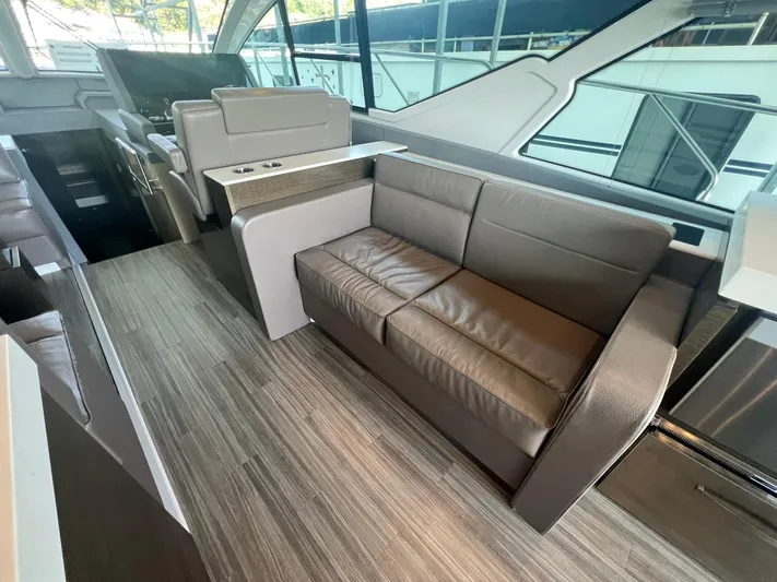Mon Cheri Yacht Photos Pics 2018 Cruisers Yachts 54 Cantius interior with modern seating and sleek design.