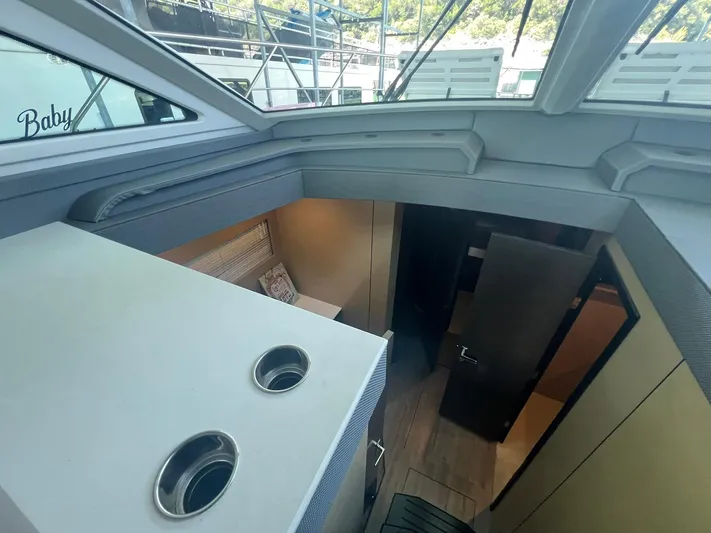Mon Cheri Yacht Photos Pics 2018 Cruisers Yachts 54 Cantius interior with modern design and skylight view.