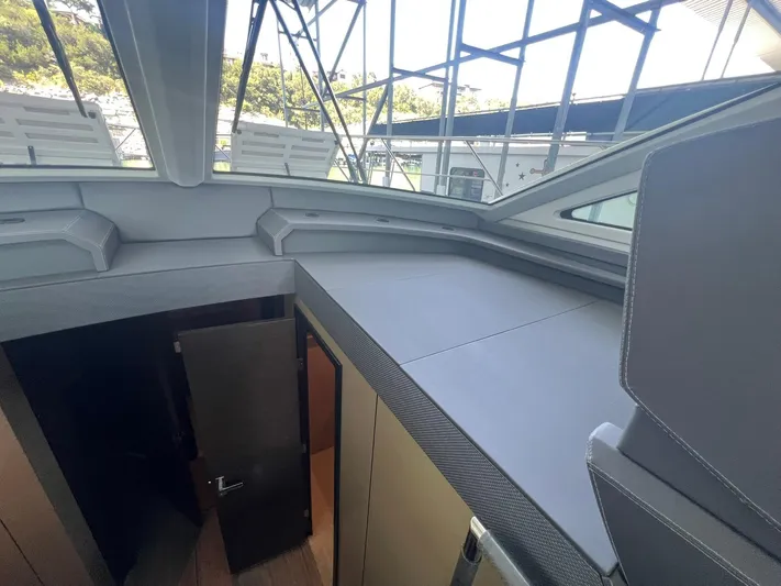 Mon Cheri Yacht Photos Pics 2018 Cruisers Yachts 54 Cantius interior with modern design and large windows.