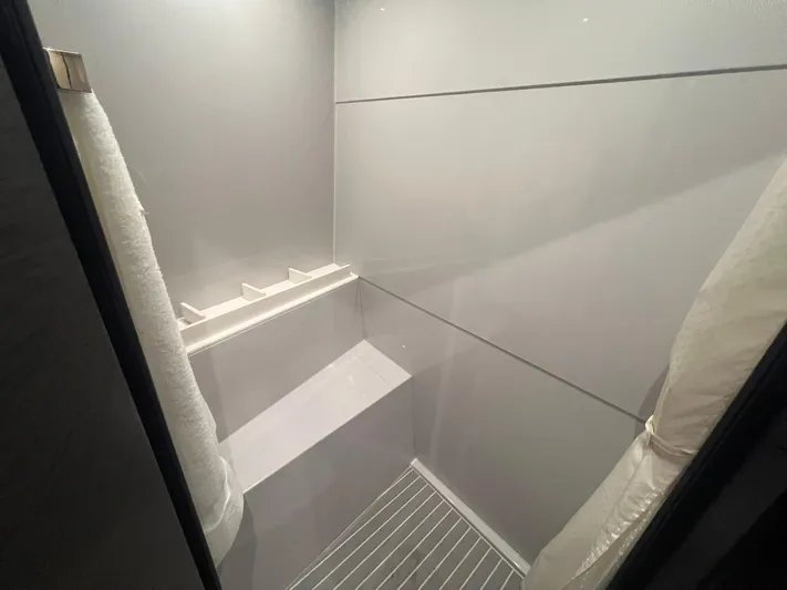 Mon Cheri Yacht Photos Pics Shower area in 2018 Cruisers Yachts 54 Cantius, featuring sleek modern design.