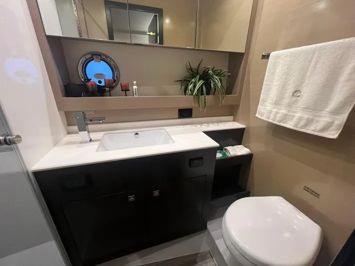 Mon Cheri Yacht Photos Pics Luxurious bathroom in 2018 Cruisers Yachts 54 Cantius with modern fixtures and elegant design.