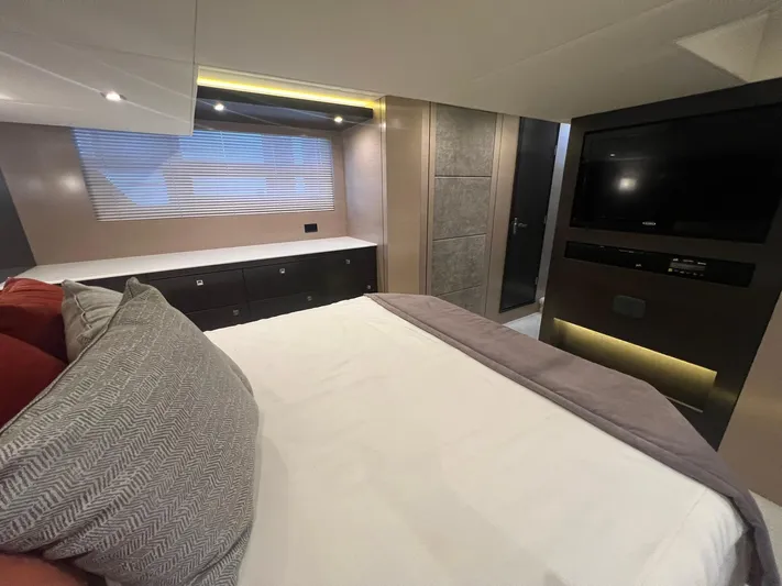 Mon Cheri Yacht Photos Pics Luxurious bedroom interior of 2018 Cruisers Yachts 54 Cantius with modern design and amenities.
