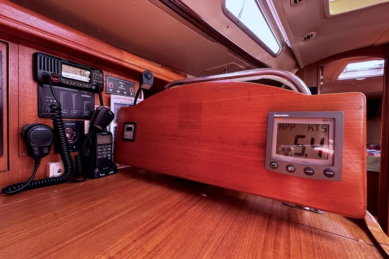  Yacht Photos Pics Control panel of a 2006 Hunter 38 sailboat with navigation instruments.