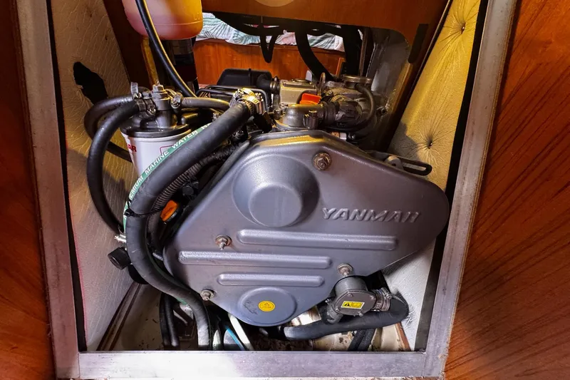  Yacht Photos Pics Engine compartment of a 2006 Hunter 38 sailboat with Yanmar engine.