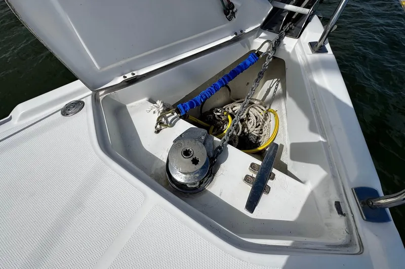  Yacht Photos Pics Anchor locker of a 2006 Hunter 38 sailboat with ropes and chain.