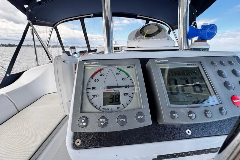  Yacht Photos Pics Cockpit view of 2006 Hunter 38 sailboat with navigation instruments and compass.