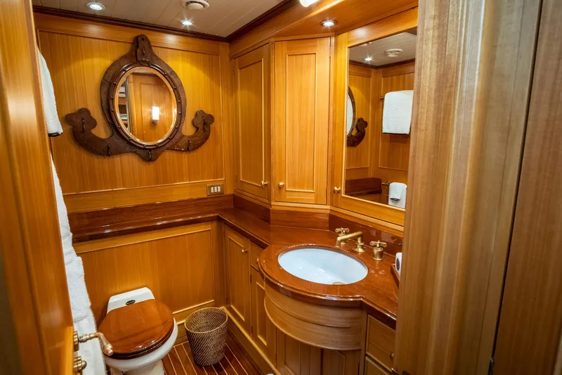 Fortuna Yacht Photos Pics Luxurious wooden bathroom interior on a 1999 Palmer Johnson motor yacht.