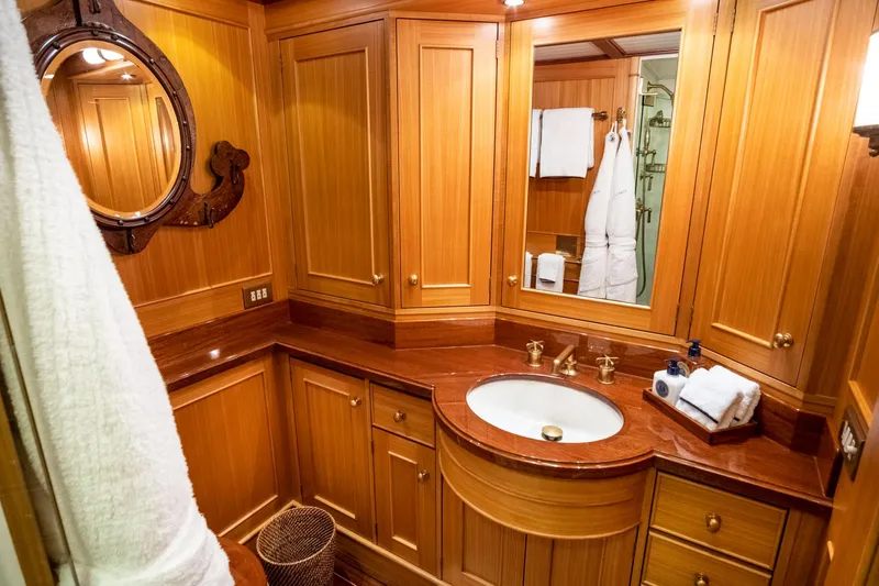 Fortuna Yacht Photos Pics Luxurious wooden bathroom interior on a 1999 Palmer Johnson motor yacht.
